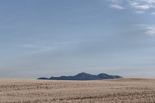 Sweetgrass HIlls Peeking Over the Horizon