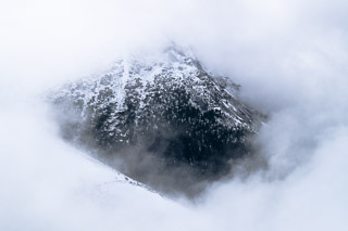 Mountain Through Clouds