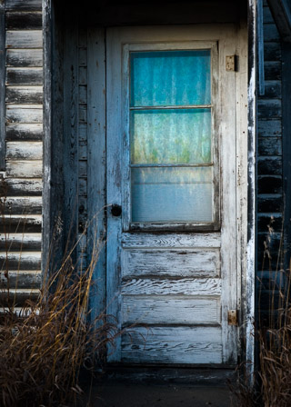 Reflections in Abandoned Door