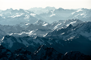 Snowy Peaks into the Distance