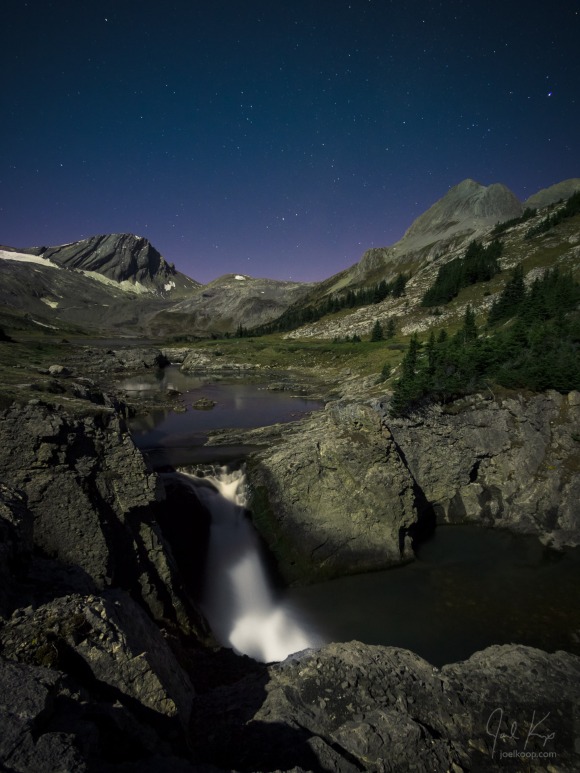 aster lake waterfall night